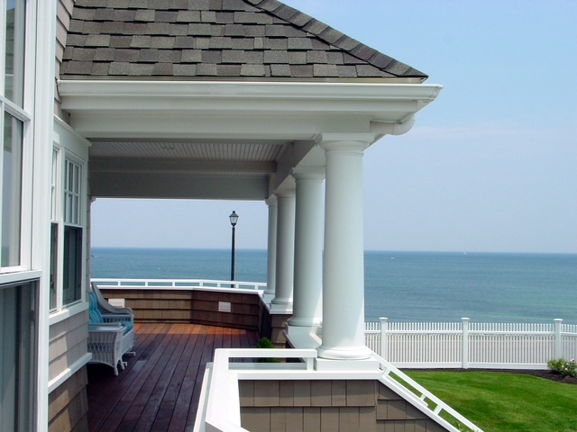 Oceanfront porch of a Chilton Development custom home in Scituate, MA with sweeping ocean views